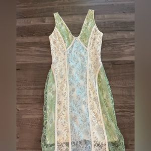 This gorgeous lace dress creates an ultra-romantic look for Spring or Summer!